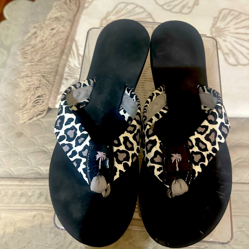 Eliza B flip flops.